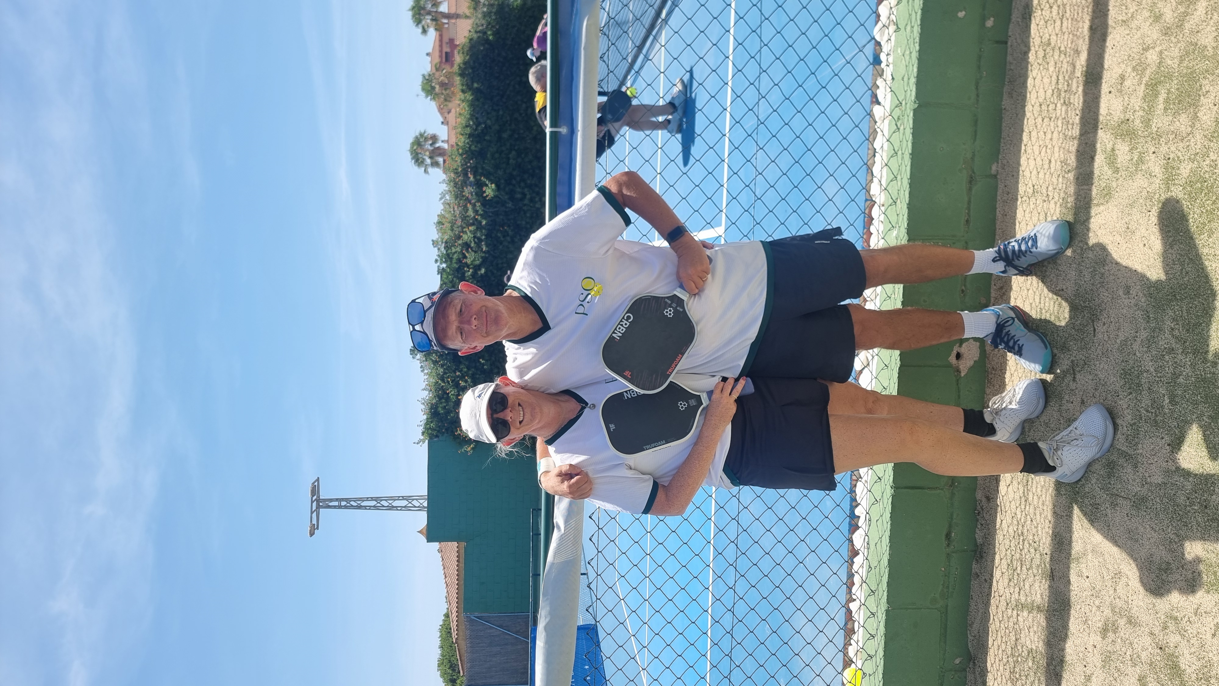 Dave and Louise at ReBALLution Pickleball Rota, holding their paddles